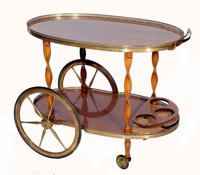 Appraisal: A s two tier trolley with galleried top twisted supports