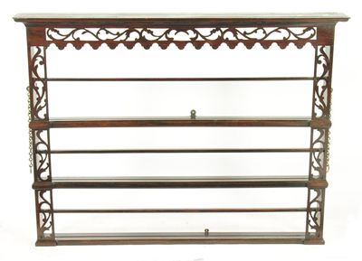 Appraisal: A th century oak Delft rack with pierced panel decoration