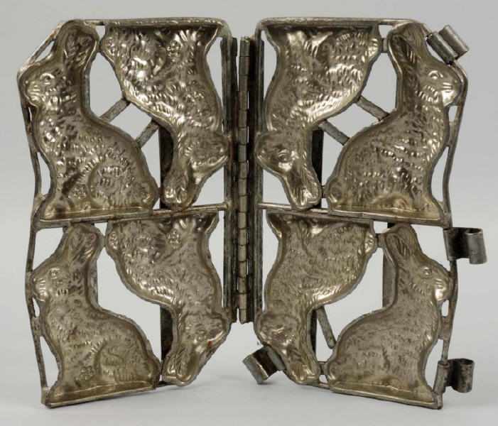 Appraisal: Metal Easter Rabbit Chocolate Mold Description Four rabbits Condition Excellent