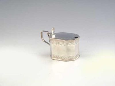 Appraisal: A George III bright engraved mustard pot of canted form