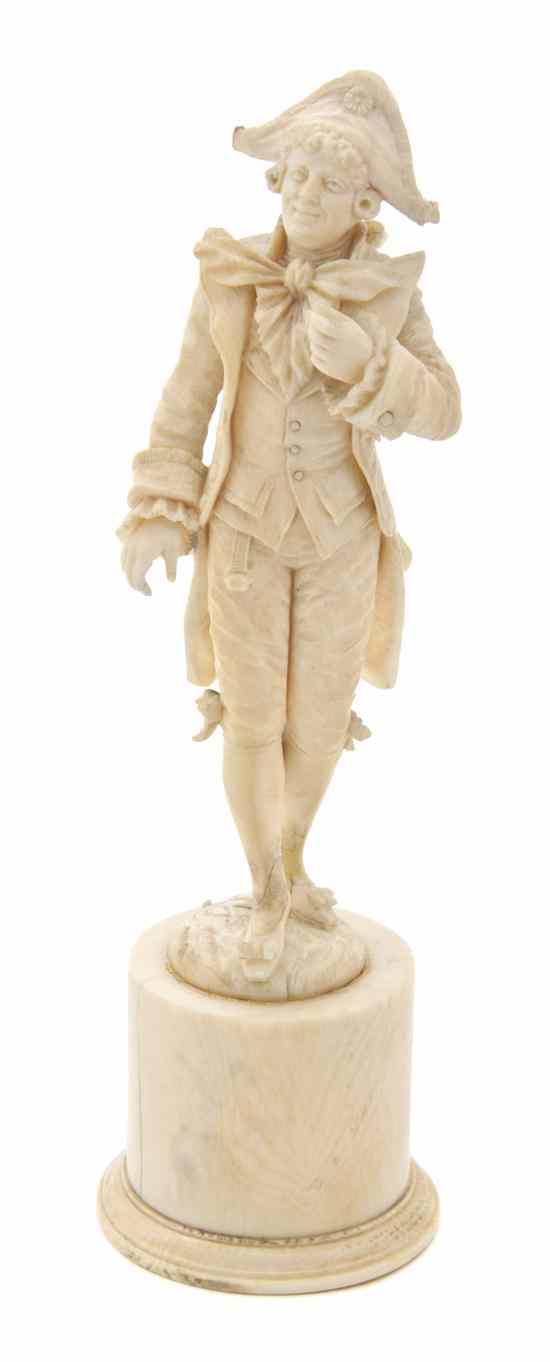 Appraisal: A Continental Carved Ivory Figure depicting a man in th