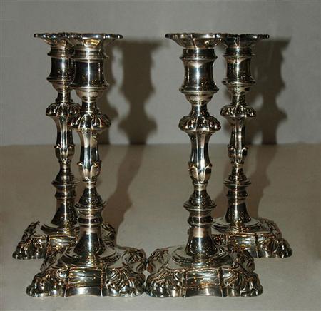 Appraisal: Set of Four Sheffield Silver Plated Candlesticks Estimate nbsp nbsp