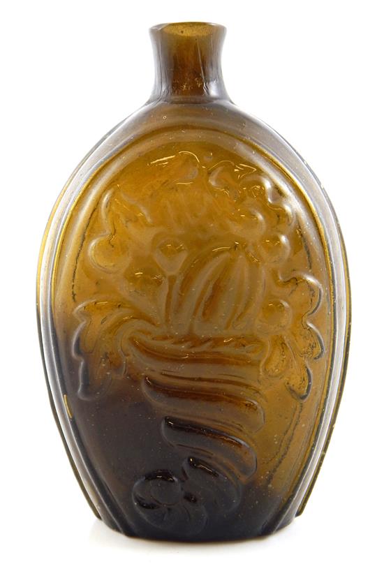 Appraisal: GLASS CORNUCOPIA URN bottle honey amber sheared lip with pontil