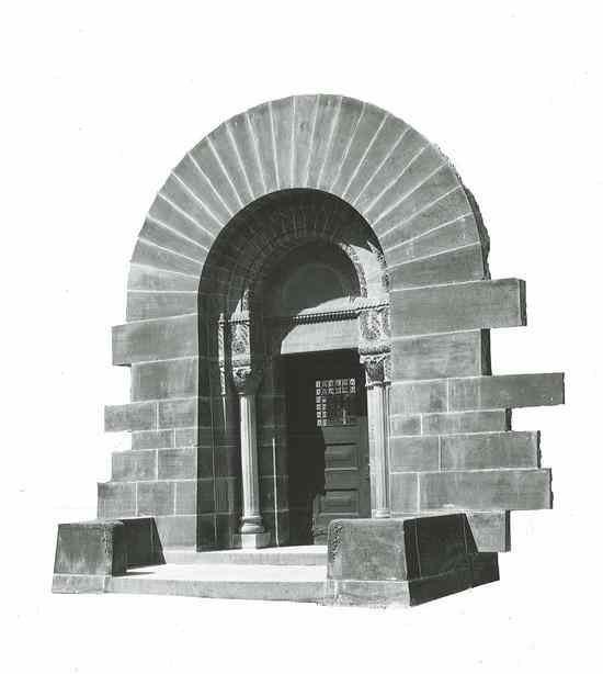 Appraisal: CARVED LIMESTONE DOORWAY AND SURROUND IN FORM OF ROMANESQUE ARCH