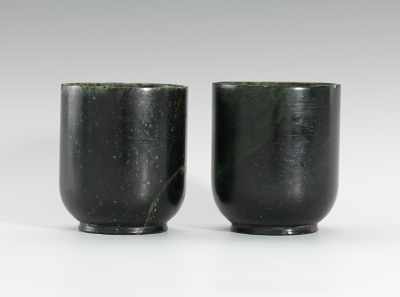 Appraisal: Pair of Chinese Carved Spinach Jade Cups Mottle green with