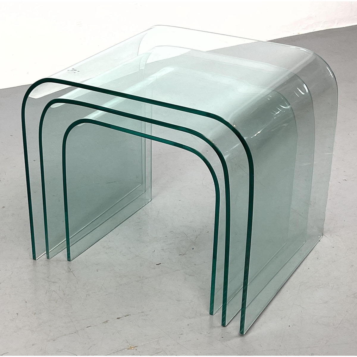 Appraisal: Set of Curved Glass Nesting Tables slumped glass Dimensions H