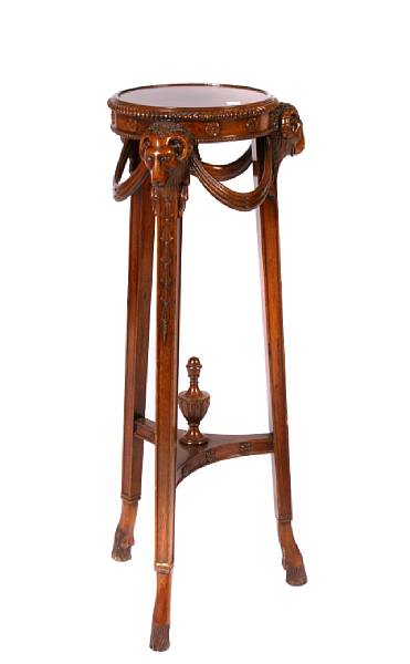 Appraisal: A pair of Neoclassical style mahogany plant stands height in