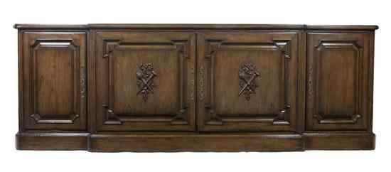 Appraisal: A Continental Breakfront Form Sideboard set with four paneled doors