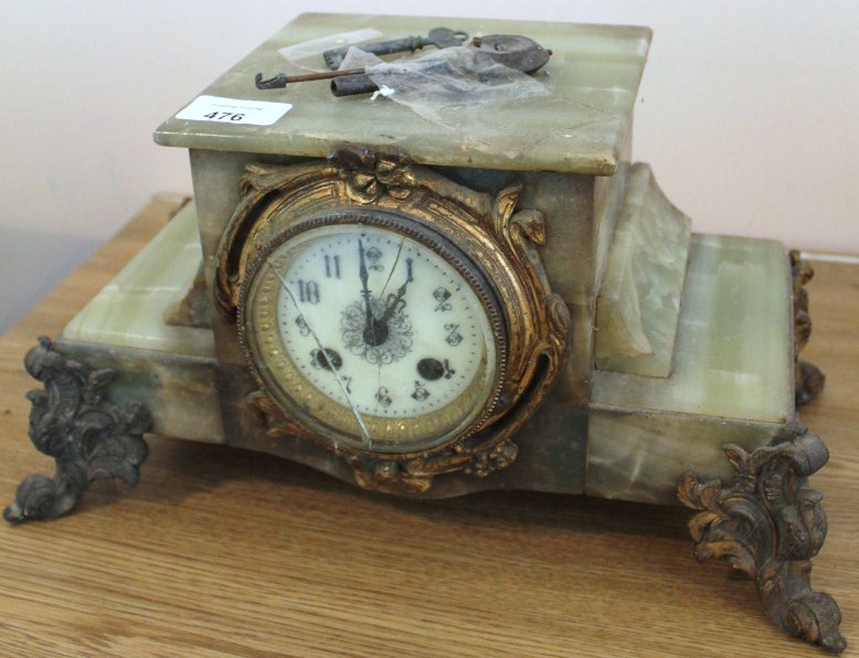 Appraisal: A Victorian gilt brass and onyx mantel clock with eight