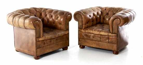 Appraisal: Pair leather club chairs typical form with low rounded tufted