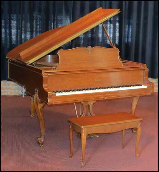 Appraisal: BALDWIN GRAND PIANO Serial number Together with a bench ''