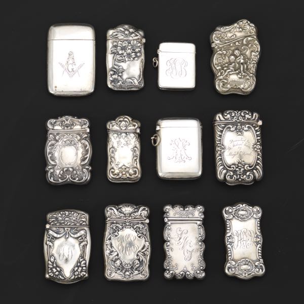 Appraisal: COLLECTION OF ANTIQUE TWELVE STERLING SILVER MATCH SAFES INCLUDING ENGLISH