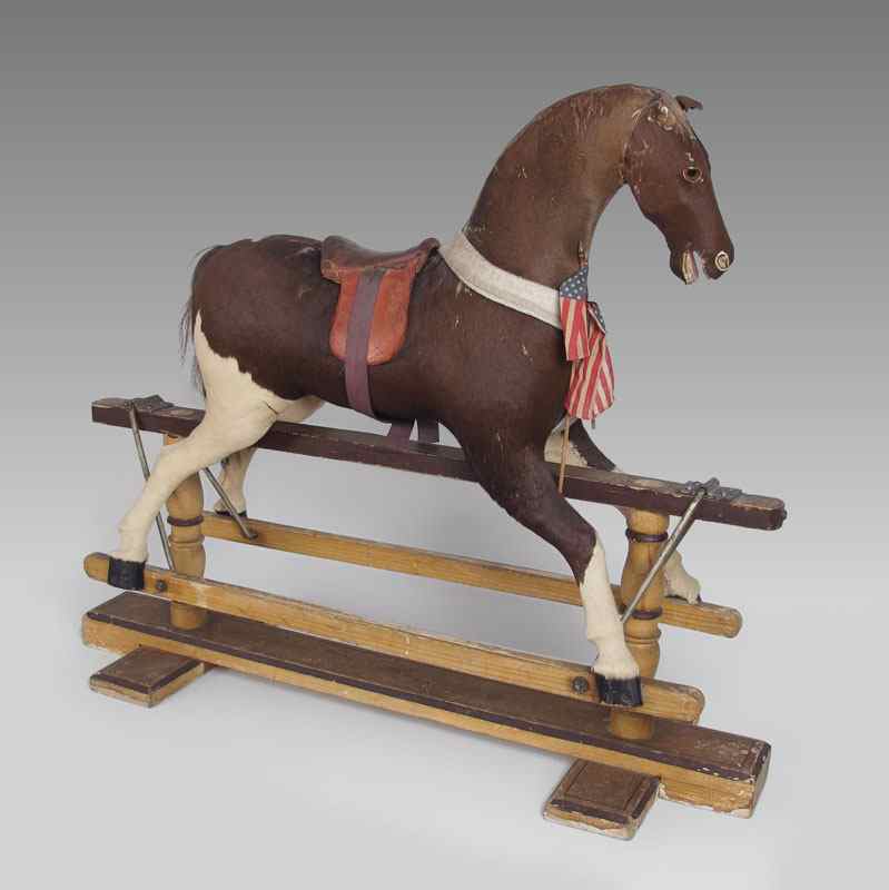 Appraisal: EARLY TH CENTURY CHILDS GLIDER ROCKING HORSE Circa - Stuffed