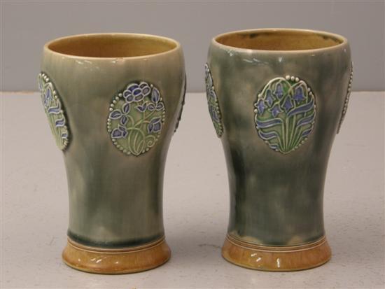 Appraisal: Pair of Royal Doulton stoneware vases with stylised floral decoration