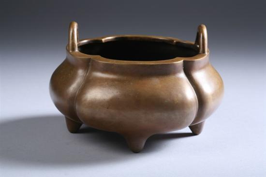 Appraisal: CHINESE BRONZE TRIPOD CENSER Qing Dynasty Gansu province Of quatrefoil-form