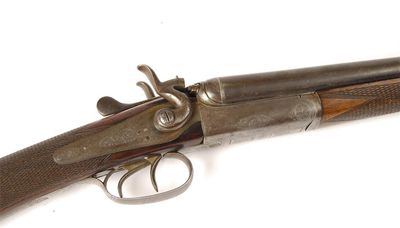 Appraisal: A side by side hammer shotgun by A W Gamage