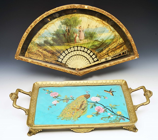 Appraisal: A FRENCH PAINTED PAPER AND MOTHER OF PEARL FAN displayed