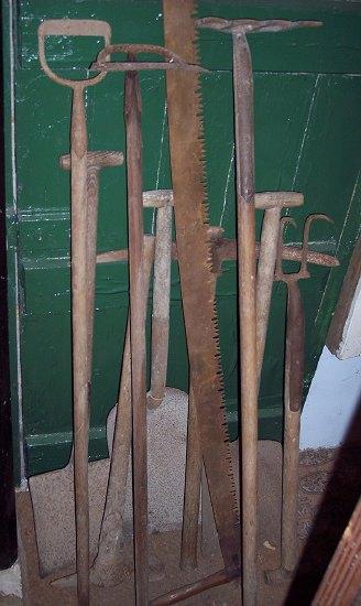 Appraisal: A deep coal shovel and sundry tools including double-handled saw