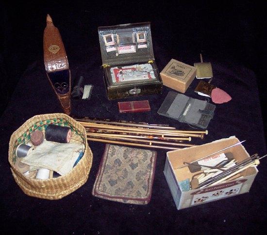 Appraisal: An Edwardian cased sewing kit and contents Walker Manchester sundry