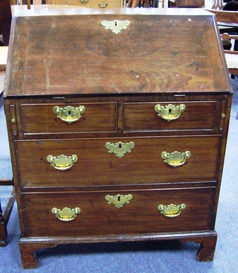 Appraisal: A th Century mahogany bureau the fall enclosing a fitted