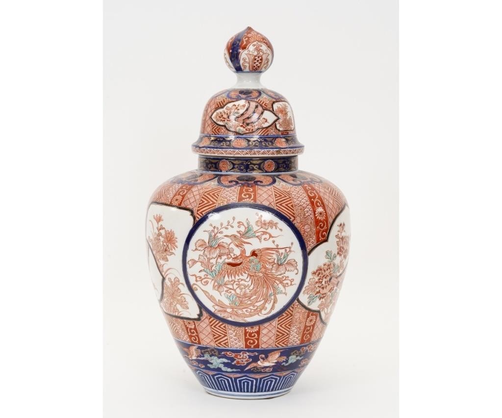 Appraisal: Large Japanese colorful Imari covered urn th c decorated with