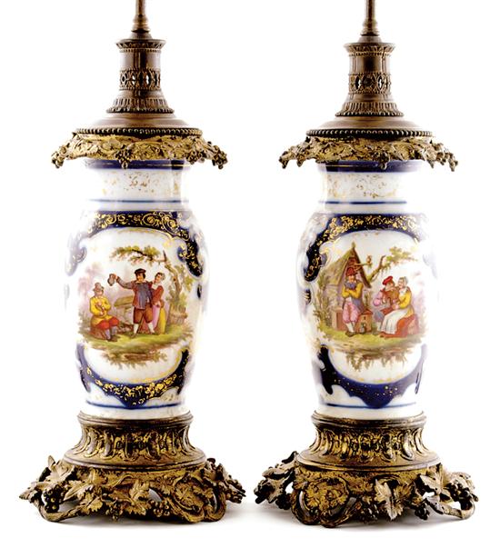 Appraisal: Pair Continental gilt-bronze mounted porcelain lamps early th century possibly