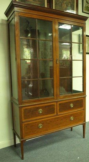 Appraisal: A late th Century mahogany display case the cornice above