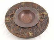 Appraisal: A copper brazier bowl with carved wooden surround stand and