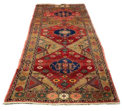 Appraisal: A North East Persian Heriz runner cm x cm