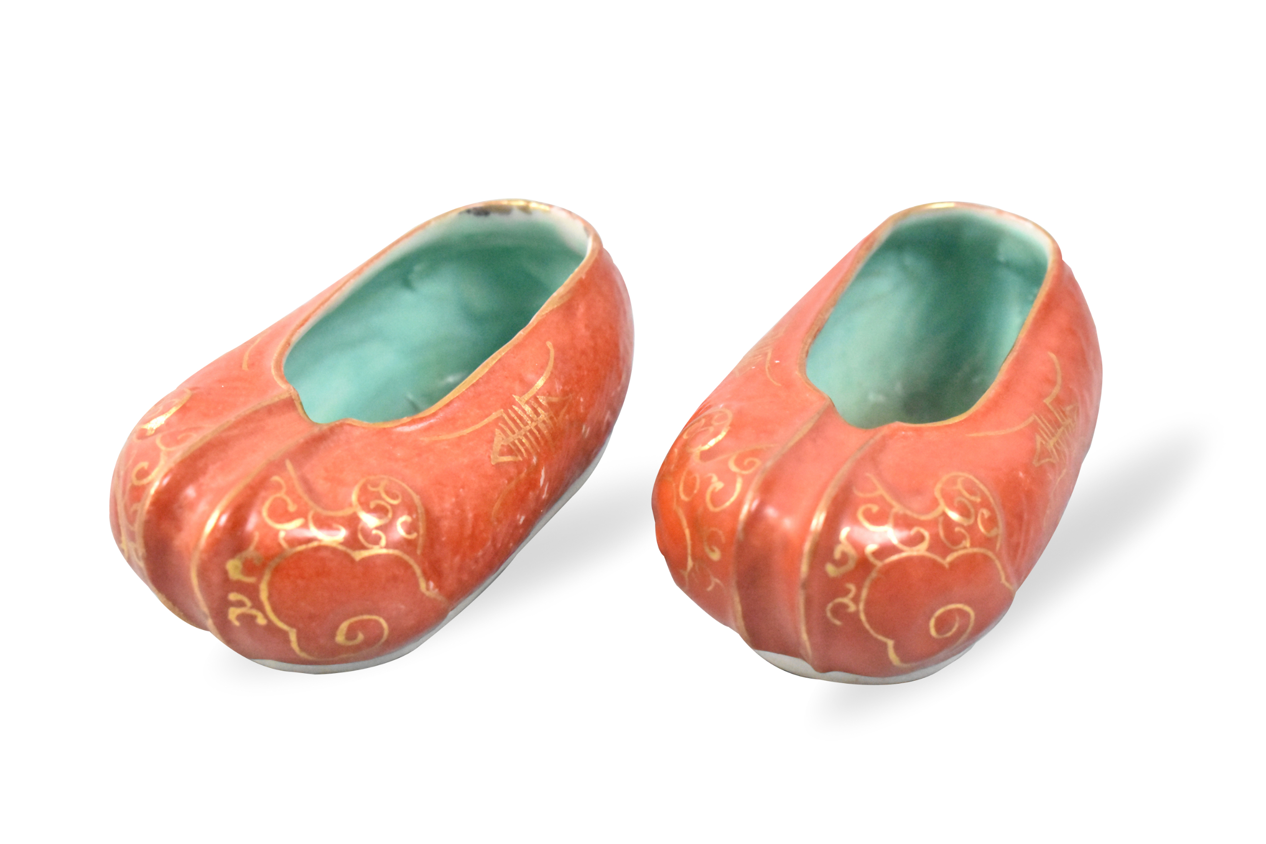 Appraisal: A pair of Chinese Gilt coral red porcelain shoes dating