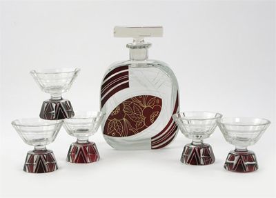 Appraisal: A Czechoslovakian Art Deco glass decanter and five glasses ruby