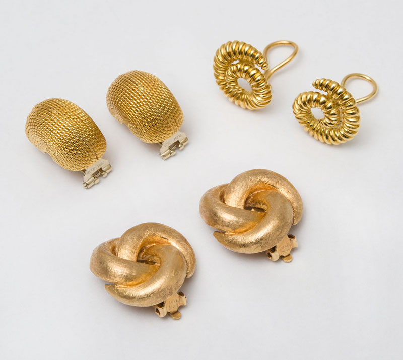 Appraisal: THREE PAIRS OF GOLD EARCLIPS Including a pair of k