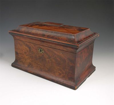 Appraisal: A Victorian mahogany rectangular tea caddy with flared base and