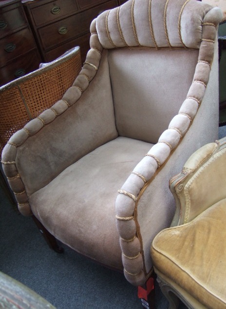 Appraisal: A late th century mahogany framed armchair the downswept arms