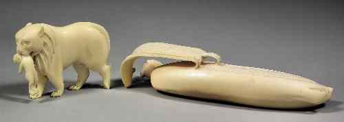 Appraisal: A Japanese carved ivory model of a partly peeled banana