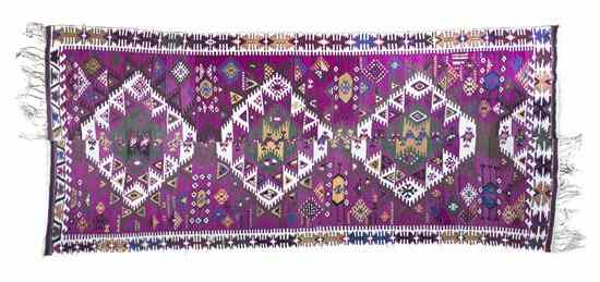 Appraisal: A Kilim Wool Flatweave Rug joined at the center having