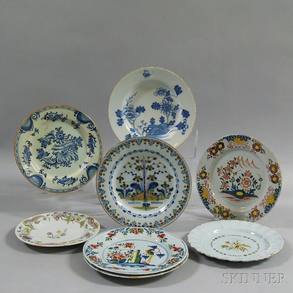 Appraisal: Eight Mostly Polychrome Delft Plates th century one with bianco