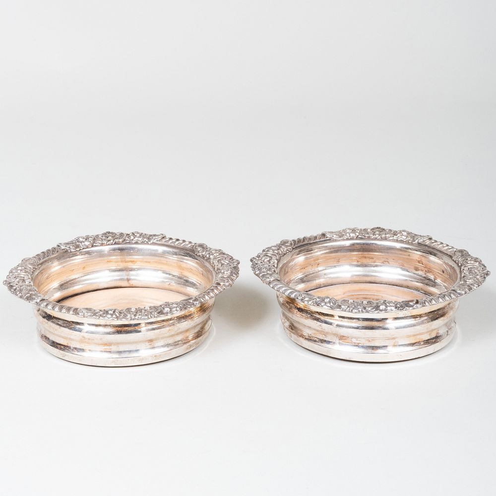 Appraisal: Pair of Silver Plate Wine Bottle Coasters in diam Property