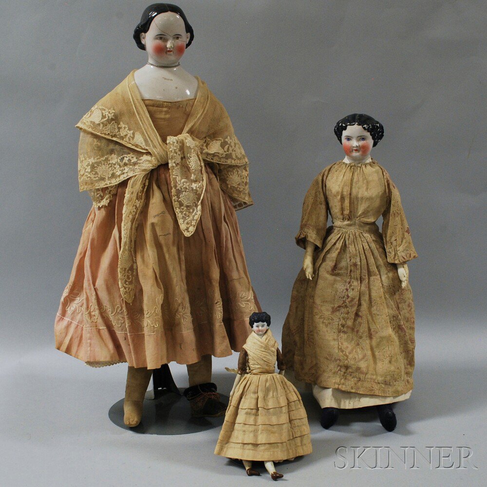 Appraisal: Three China Shoulder Head Dolls Germany all with molded and