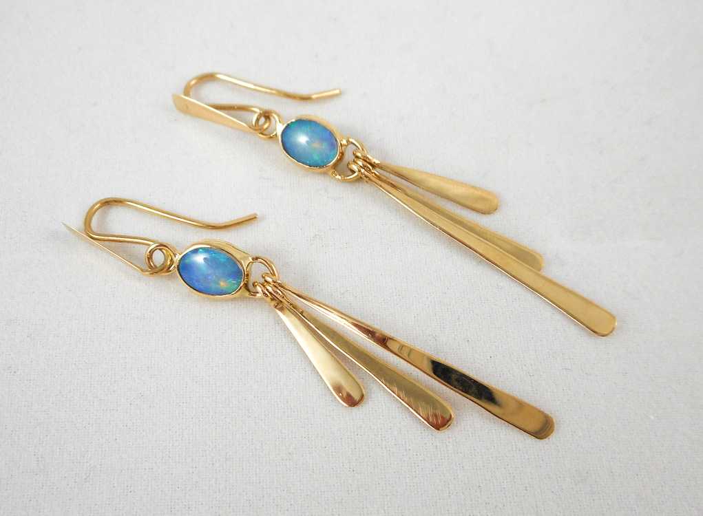 Appraisal: PAIR OF OPAL AND YELLOW GOLD DANGLE EARRINGS each measuring