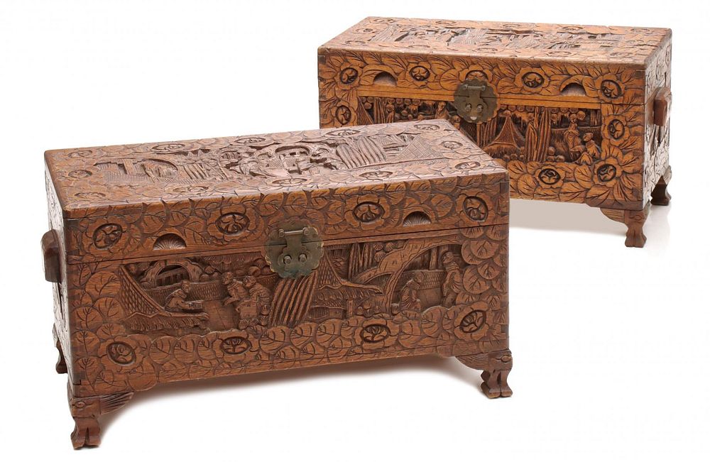 Appraisal: A PAIR EARLY TH C HIGHLY CARVED CAMPHOR WOOD CHESTS