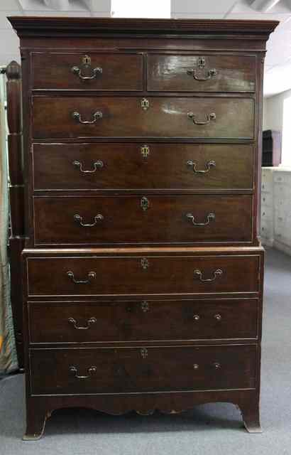 Appraisal: A George III mahogany tallboy with moulded cornice and dentil