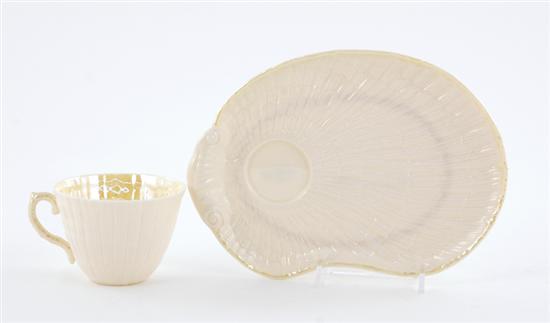 Appraisal: Belleek porcelain teacups and sandwich plates seashell molded pattern cups