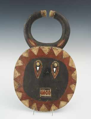 Appraisal: A Carved and Painted African Tribal Goli Mask The circular