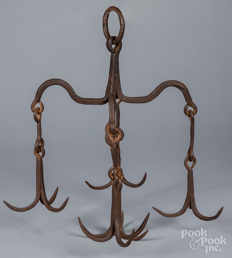 Appraisal: Wrought iron hanging meat rack th c Wrought iron hanging