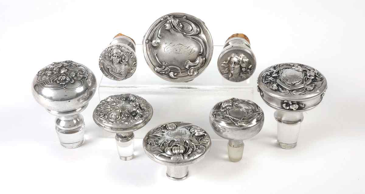 Appraisal: PIECE ART NOUVEAU STERLING BOTTLE STOPPERS To include Woodside Sterling