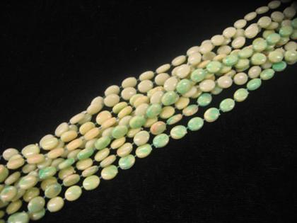 Appraisal: Multi strand chartreuse bakelite and early plastic necklace Ten strands