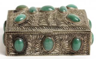 Appraisal: Silver The small rectangular box covered with scrolling filigree into