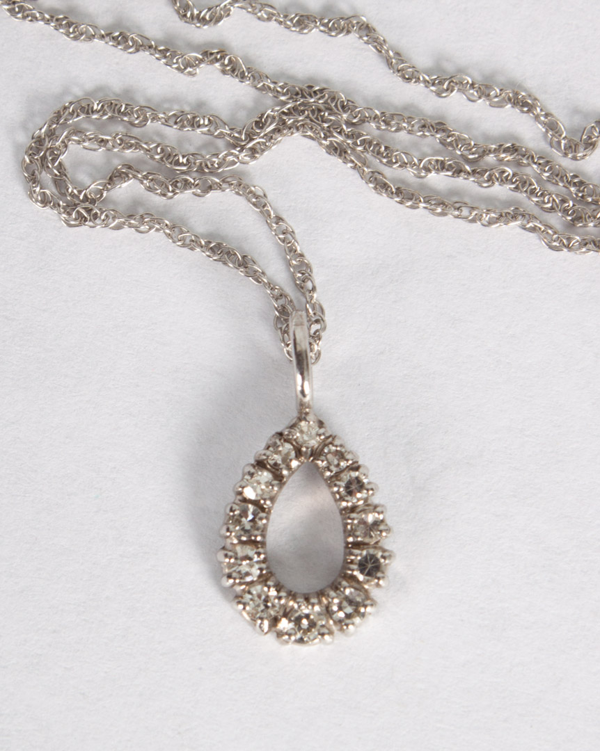 Appraisal: White gold diamond pendant necklace unmarked white gold tear-shape pendant