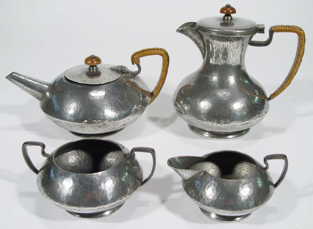 Appraisal: Libertys Tudric Art Nouveau four piece pewter tea set with